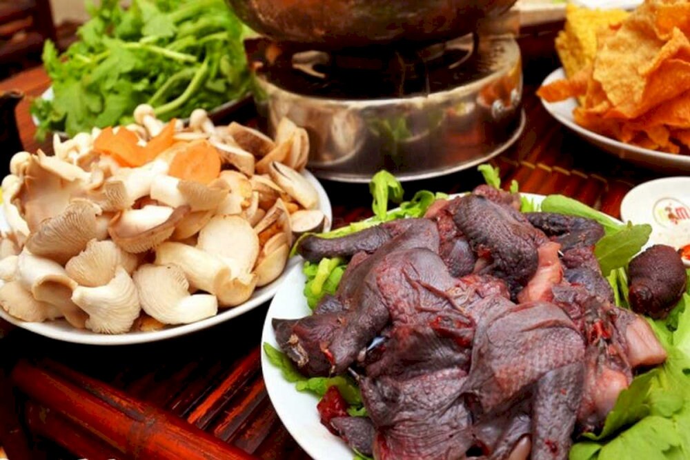 A pot of herbal black chicken hotpot – warming and nourishing